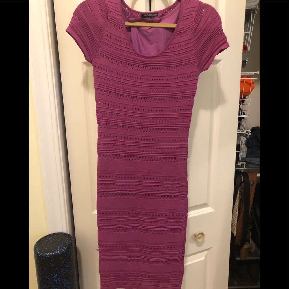Fuschia dress w/sewn in slip. Hits at the knee.